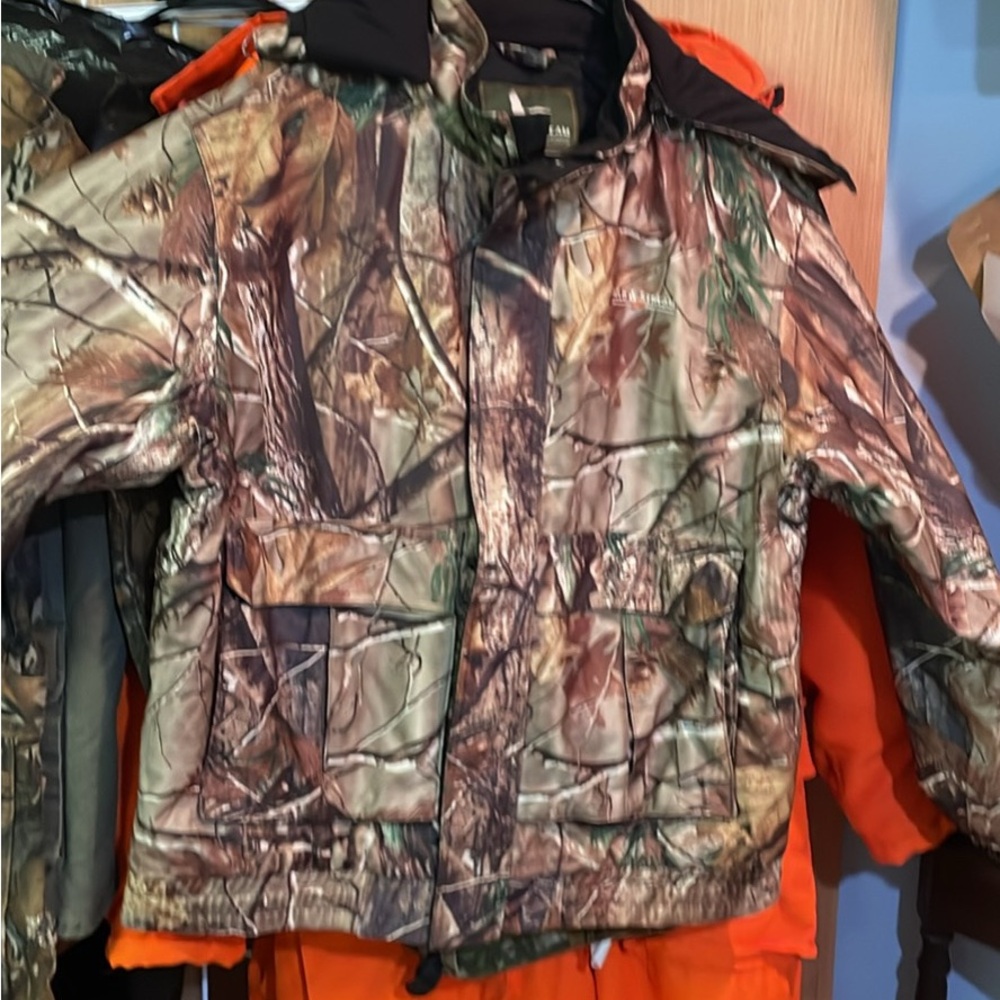 Field and Stream camouflage jacket with hood. Size medium like new